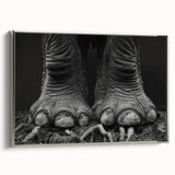 Framed canvas wall art featuring a silver side view of an elephant, showcasing intricate details and textures, perfect for adding a touch of wildlife elegance to home decor.