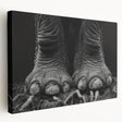 Stretched canvas wall art showcasing a majestic side view of an elephant in a natural habitat, emphasizing intricate details and earthy tones, perfect for wildlife enthusiasts.