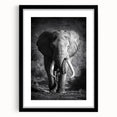 Black-framed wall art featuring a detailed illustration of an elephant, showcasing intricate lines and textures, perfect for wildlife enthusiasts and modern decor.