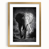 Elegant gold-framed wall art showcasing a majestic elephant design, set against a minimalist backdrop. Ideal for nature lovers and modern home decor enthusiasts.