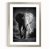 Framed wall art featuring a majestic elephant design in silver, showcasing intricate details and textures, perfect for wildlife enthusiasts and home decor.