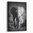 Framed canvas wall art featuring a realistic black and white side view of an elephant, set against a minimalistic background, perfect for nature-themed decor.