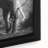 Close-up of a framed canvas wall art featuring a majestic elephant design in vibrant colors, highlighting its intricate textures and details for a captivating wildlife decor piece.