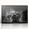 Framed wall art featuring a striking black front view of an elephant design, showcasing intricate details and vibrant colors, perfect for wildlife enthusiasts.