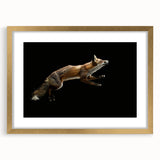 Framed wall art featuring a stylish fox design in vibrant colors, accented with a gold frame and mat, ideal for adding a chic touch to home decor.