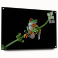 Vibrant acrylic wall art featuring a detailed frog design, showcasing rich greens and blues. The piece is elegantly displayed from the side with decorative pins, ideal for wildlife enthusiasts and modern decor.