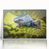 Framed wall art featuring a vibrant frog design from the A Wild Life collection, showcasing bright green hues and intricate details against a sleek white frame, perfect for nature enthusiasts.