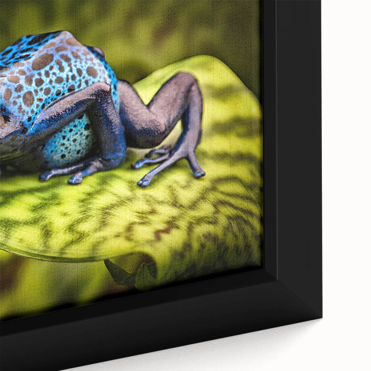 Close-up of a vibrant green frog design on framed canvas wall art, showcasing intricate details and textures, perfect for wildlife-themed decor.