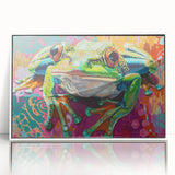 Framed acrylic wall art featuring a vibrant frog design from the 'Animals of the Wild' collection, set against a sleek white background, perfect for nature-themed decor.