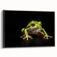 Framed wall art featuring a vibrant frog design on textured canvas, showcasing a black frame and side view, ideal for nature enthusiasts and home decor.