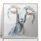 Framed wall art featuring a stylized goat design in a white frame, showcasing vibrant colors and intricate details, perfect for animal lovers and modern decor enthusiasts.