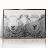 Framed wall art featuring a modern goat design in gold and black, set against a sleek acrylic background, ideal for animal-themed decor and stylish interiors.