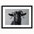 Black-framed wall art featuring a goat design from the "Animals a Wild Life" collection, elegantly matted to enhance its vibrant colors, perfect for animal lovers.