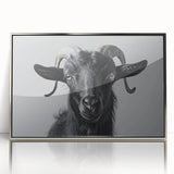 Framed wall art featuring a striking goat design in a wild-life theme, showcased in an elegant silver frame, perfect for nature lovers’ decor.