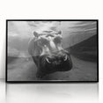 Framed wall art featuring a striking black and white illustration of a hippopotamus in a frontal view. The art piece showcases intricate details, perfect for animal lovers and unique home decor.