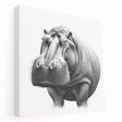 Side view of a vibrant stretched canvas wall art featuring a hippopotamus in its natural habitat, showcasing rich colors and intricate details, perfect for wildlife enthusiasts.