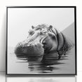 Framed wall art featuring a striking black acrylic design of a hippopotamus, showcasing intricate details and vibrant colors, perfect for wildlife enthusiasts.