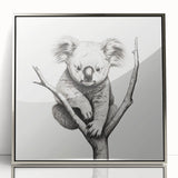 Framed wall art featuring a serene koala design in a silver-acrylic finish, showcasing vibrant colors and intricate details, perfect for wildlife enthusiasts.