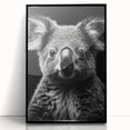 Framed wall art featuring a detailed koala design in a black frame, showcasing vibrant colors and intricate textures, perfect for wildlife lovers and home decor.