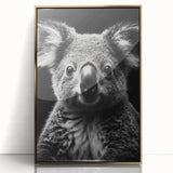 Framed wall art featuring a realistic koala design with vibrant colors in a gold-acrylic frame, perfect for wildlife enthusiasts and home decor.