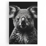Stretched canvas wall art featuring a charming koala design, set against a vibrant green background, perfect for animal lovers and nature-themed decor.