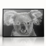 Framed acrylic wall art featuring a serene koala design, showcasing detailed textures and vibrant colors, perfect for animal lovers and home decor enthusiasts.