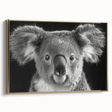 Framed canvas wall art featuring a detailed koala design, showcasing vibrant colors and textured elements, perfect for wildlife enthusiasts and home decor.