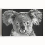 Stretched canvas wall art featuring a detailed koala design set against a vibrant natural backdrop, ideal for wildlife enthusiasts and home decor.