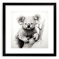 Koala wall art design framed in black, featuring a realistic illustration of a koala in a natural setting, perfect for wildlife enthusiasts and home decor.
