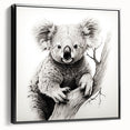 Framed canvas wall art showcasing a detailed koala design, featuring vibrant colors and a sleek black frame, perfect for nature enthusiasts and home decor.