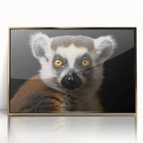 Framed wall art featuring a vibrant lemur design, showcasing intricate details and gold accents, perfect for adding a touch of wildlife decor to any room.