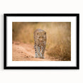 Framed wall art featuring a striking leopard design in black and gold, showcasing intricate details and textures, ideal for wildlife enthusiasts and modern decor.