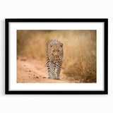 Framed wall art featuring a striking leopard design in black and gold, showcasing intricate details and textures, ideal for wildlife enthusiasts and modern decor.