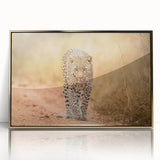 Framed wall art featuring a striking leopard design with gold accents, showcasing a vivid portrayal of wildlife in a modern acrylic frame, perfect for animal lovers.