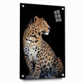 Side view of a leopard-themed wall art design, showcasing vibrant colors and intricate details printed on acrylic glass, elegantly mounted with pins for display. This artwork captures the essence of wildlife, making it a striking addition to any décor.