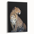 Framed canvas wall art featuring a striking leopard design in a black setting, showcasing the wild beauty of nature. Ideal for animal lovers and modern decor.