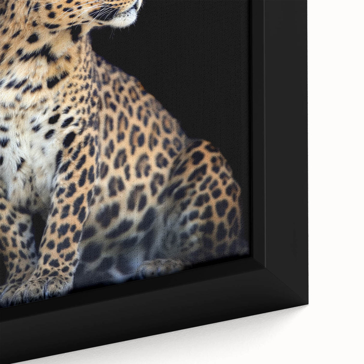 Close-up of a framed canvas wall art featuring a striking leopard design, showcasing intricate details and vibrant colors, perfect for wildlife enthusiasts and home decor.