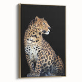 Framed canvas wall art showcasing a striking leopard design in rich gold tones, capturing the essence of wildlife elegance and perfect for home decor.