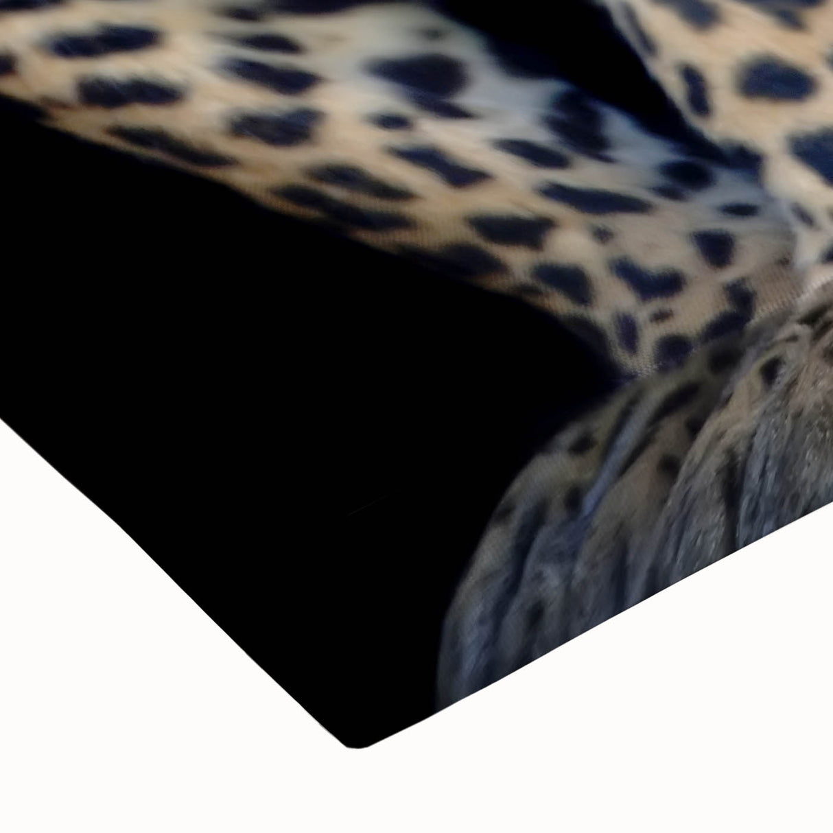 Close-up of a striking leopard design wall art on stretched canvas, showcasing vibrant colors and intricate details, perfect for animal lovers and home decor enthusiasts.