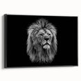 Framed canvas wall art showcasing a striking lion design, featuring intricate details and a bold black frame, perfect for animal lovers and home decor enthusiasts.