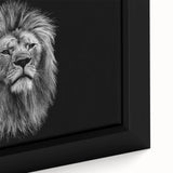 Close-up of a framed canvas wall art featuring a majestic lion design, showcasing intricate details and vibrant colors, perfect for wildlife-themed home decor.