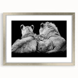 Framed wall art featuring a majestic lion design in a silver mat, perfect for wildlife enthusiasts. This elegant piece adds a touch of nature to any decor.