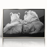 Framed acrylic wall art showcasing a majestic lion design with intricate details and a sleek silver frame, perfect for wildlife enthusiasts and home decor.