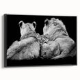 Framed wall art showcasing a striking lion design in a black color scheme, perfect for animal lovers and contemporary decor. Ideal for living rooms or offices.