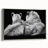 Framed canvas wall art featuring a majestic lion design, showcasing intricate details and a silver frame, perfect for adding a touch of wildlife elegance to any decor.