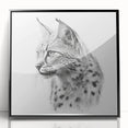 Framed acrylic wall art featuring a striking lynx design with black accents, showcasing the beauty of wildlife in a contemporary style, perfect for home decor.