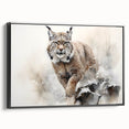 Framed canvas wall art showcasing a striking lynx design in a black frame, highlighting the wild animal's detailed features against a neutral background.