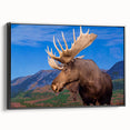 Framed canvas wall art showcasing a detailed moose and elk design, featuring natural tones of brown and green, perfect for nature-themed decor. Ideal for wildlife enthusiasts.
