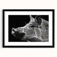 Framed wall art collection featuring a playful pig design in a black frame, highlighted by a white mat, perfect for animal lovers and home decor enthusiasts.