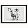 Black-framed wall art featuring a whimsical pig design from a wildlife collection, presented with a crisp white mat, ideal for animal lovers and modern decor.